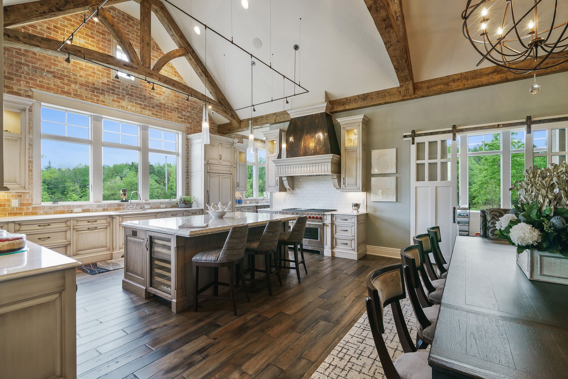 Open floor plan with dining table near kitchen and island